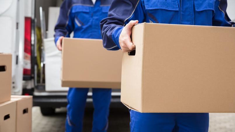 people-with-cardboard-boxes-on-heads