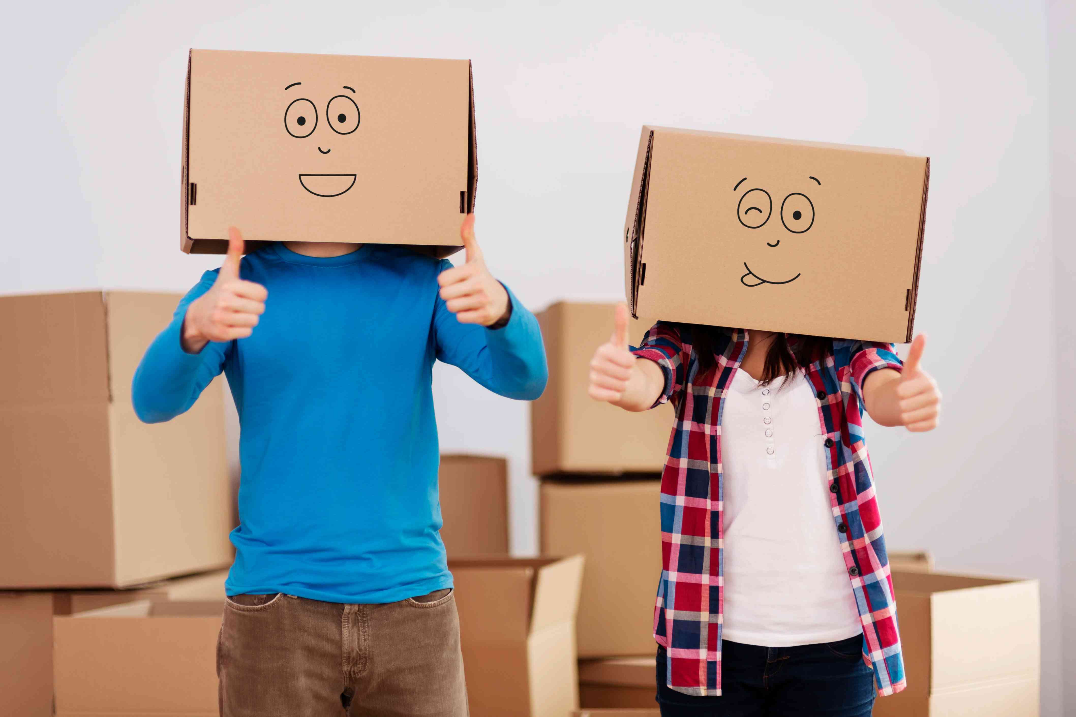 people-with-cardboard-boxes-on-heads